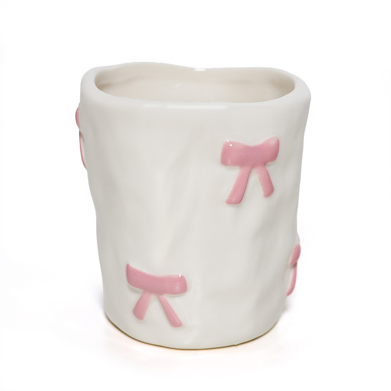 Tasse blanche motif noeud rose