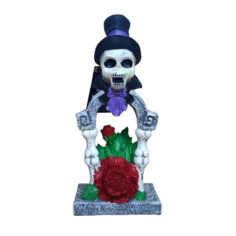 Statut squelette tombe rose los