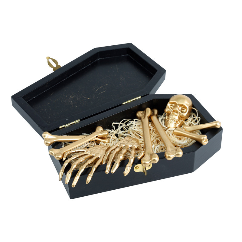 Cercueil avec squelettes dores