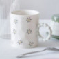 Tasse creme motif fleurs & perle