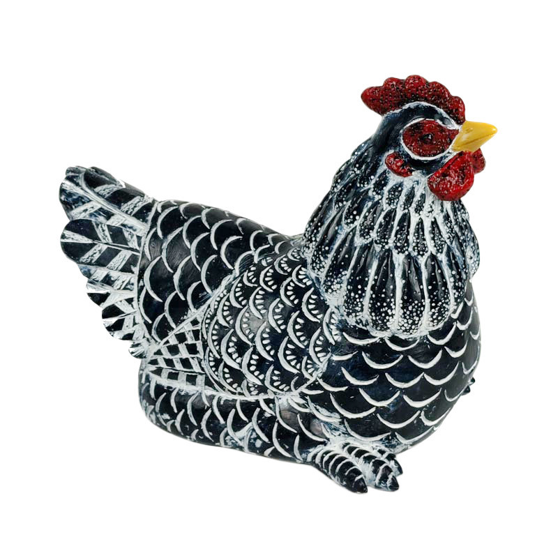 Statue poule blanche/noire