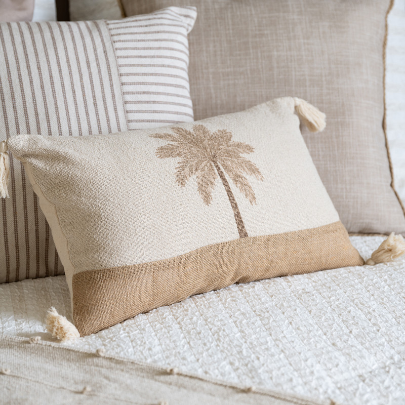 Coussin pompons palmier 50x30cm