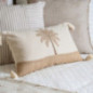 Coussin pompons palmier 50x30cm