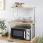 Support a micro ondes bois/blanc