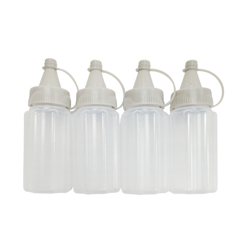 4 mini bouteilles a huile 30ml