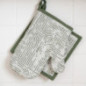 Gant et manique motif arche vert