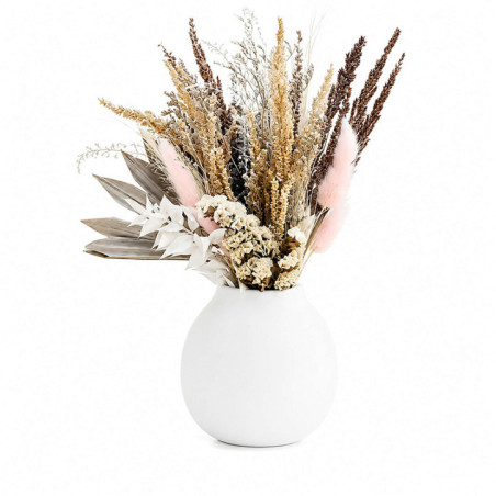 Fleurs sechees dans vase blanc