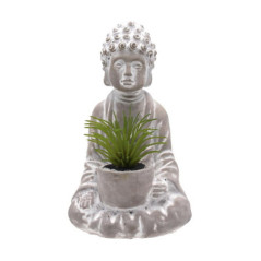 Statuette bouddha avec plante