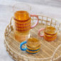 Tasse en verre cerclage paille