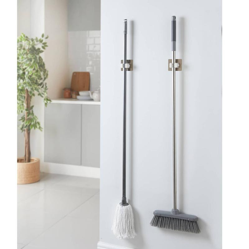 Accroche balai x2 auto adhesif